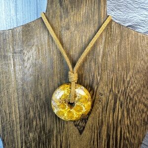 Yellow Coral Fossil Donut Pendant on Brown Faux Suede